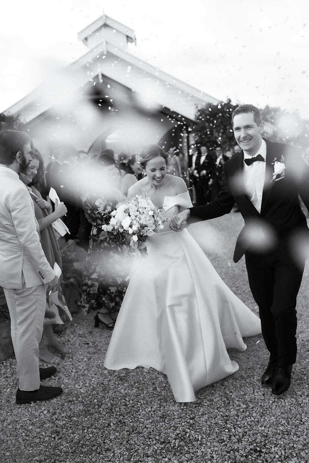 Bride and groom celebrating after their wedding ceremony
