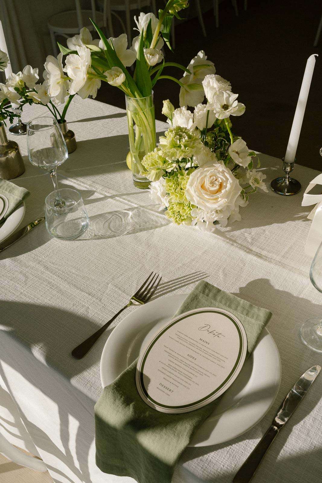 Wedding table styling with florals and elegant details