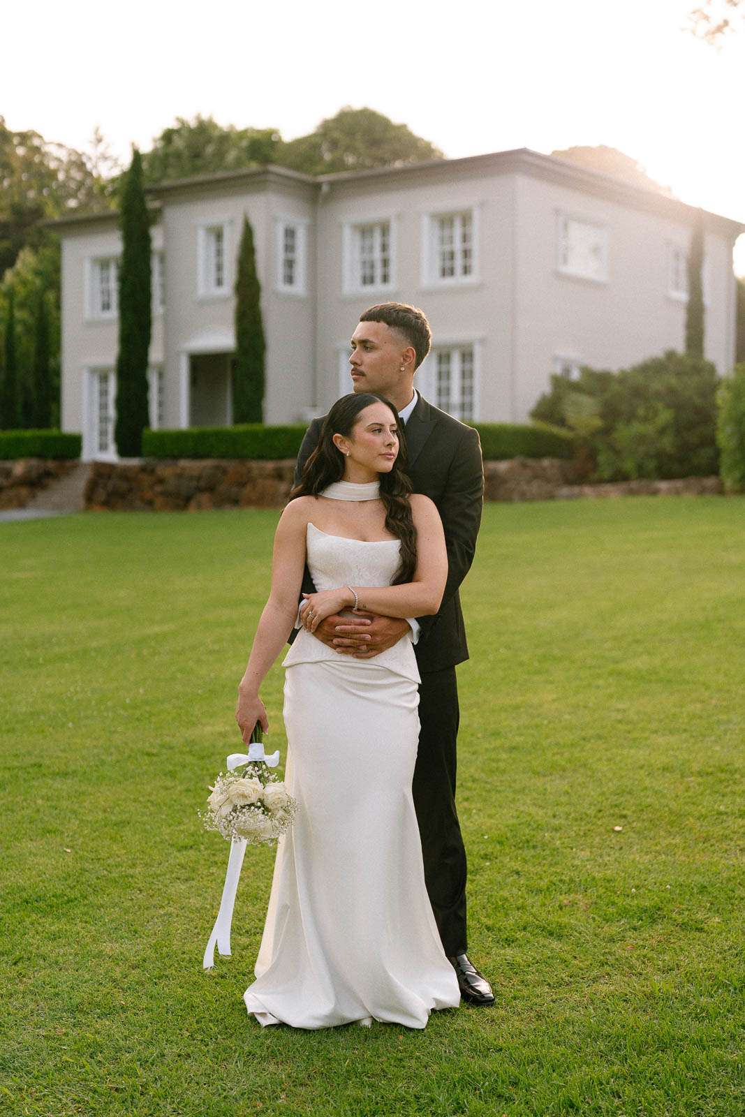 A couple getting sunset portraits at Wynmere Estate